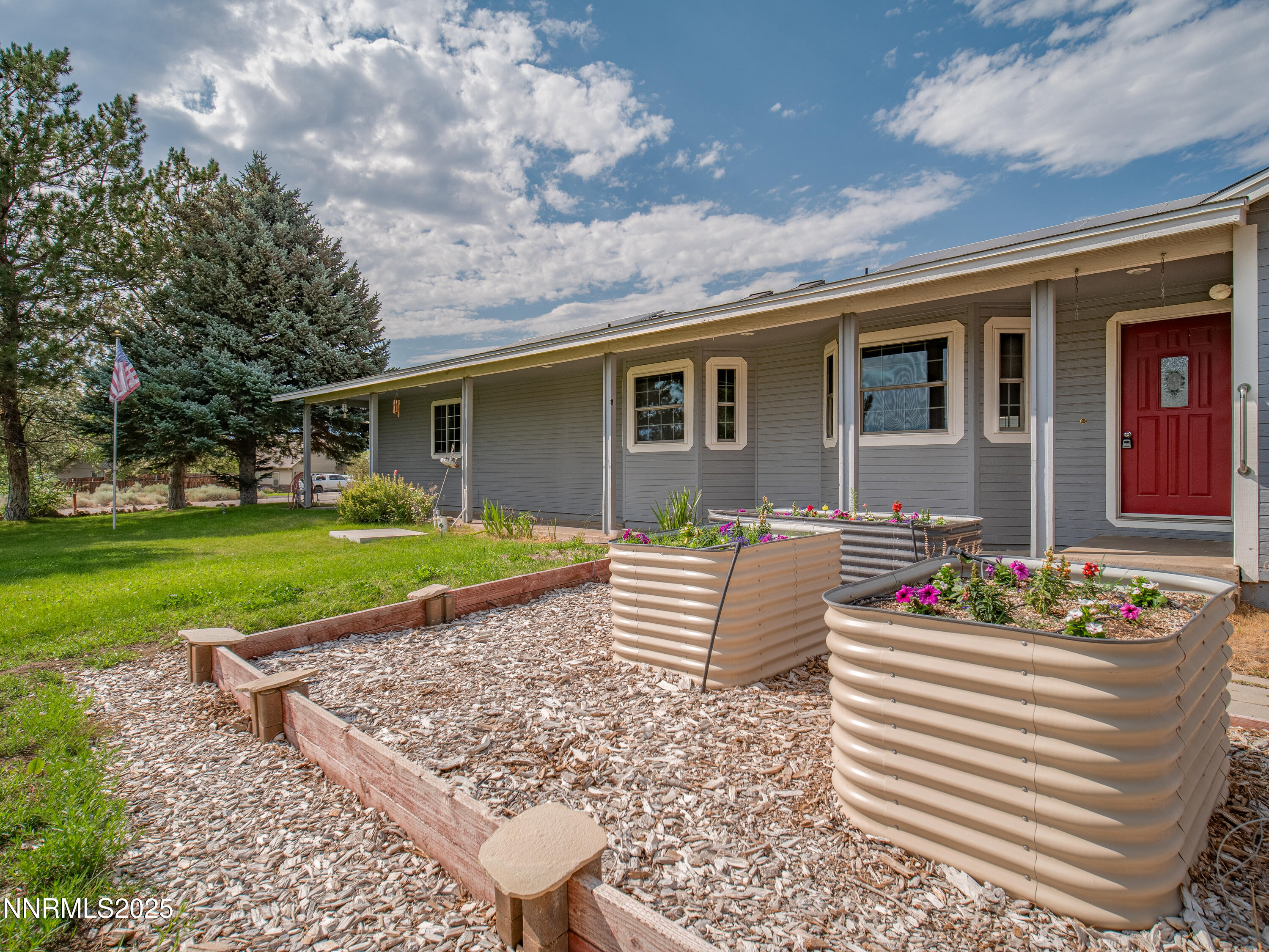 2843 Wade Street Minden, NV 89423 - Photo 1 of 74 a house with garden in front of it