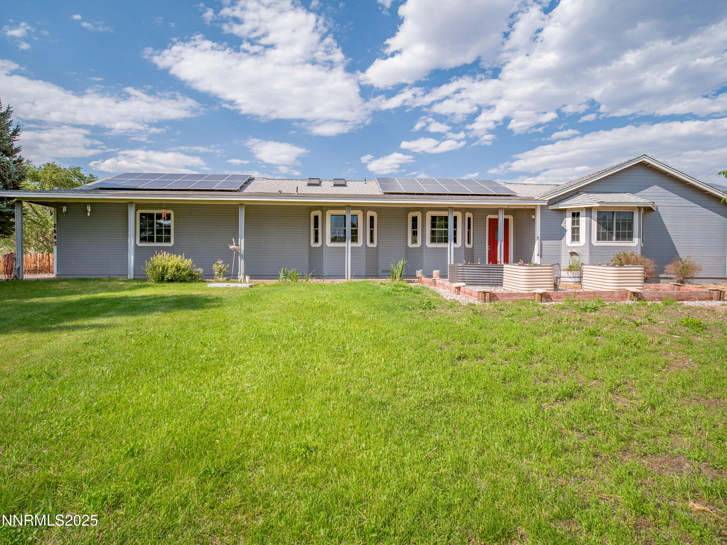 2843 Wade Street Minden, NV 89423 - Photo 12 of 74 a front view of house with yard and green space