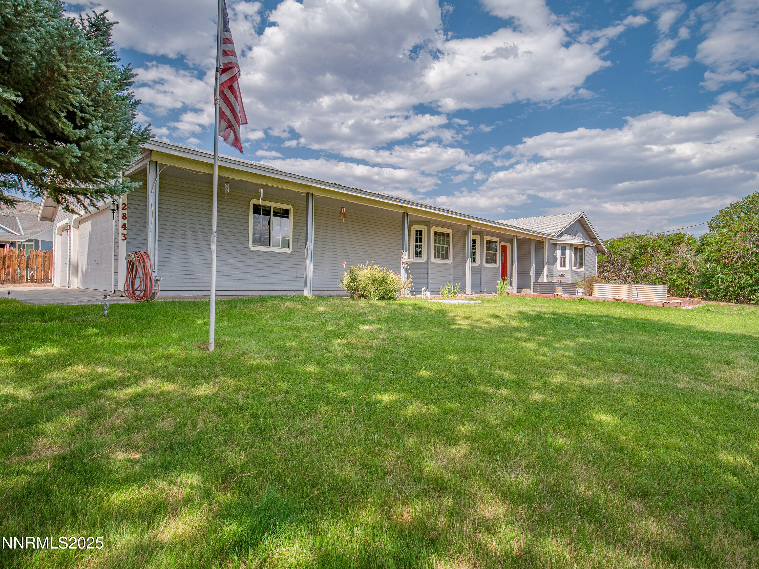 2843 Wade Street Minden, NV 89423 - Photo 13 of 74 a backyard of a house with lots of green space
