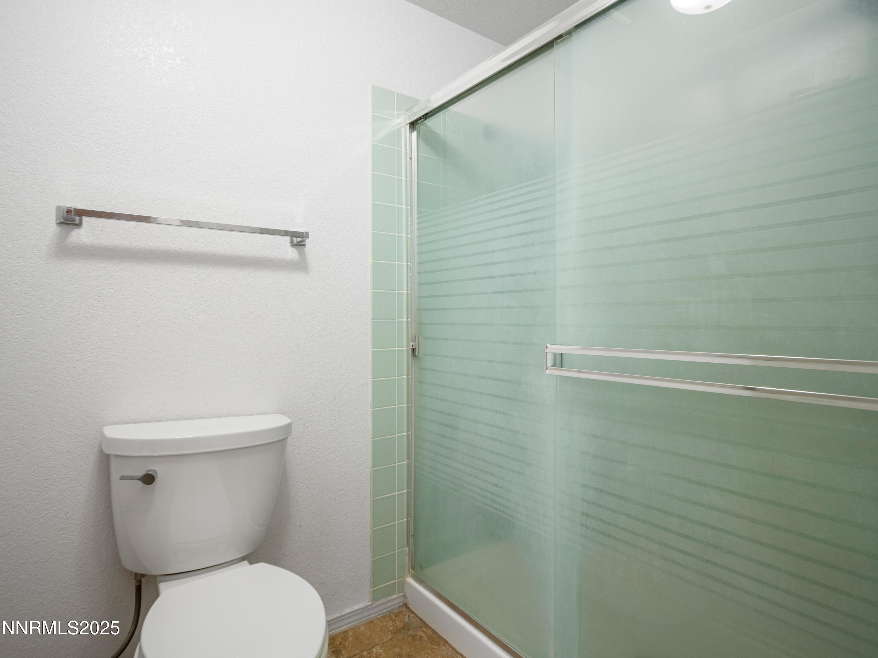 2843 Wade Street Minden, NV 89423 - Photo 41 of 74 a bathroom with a toilet and a shower