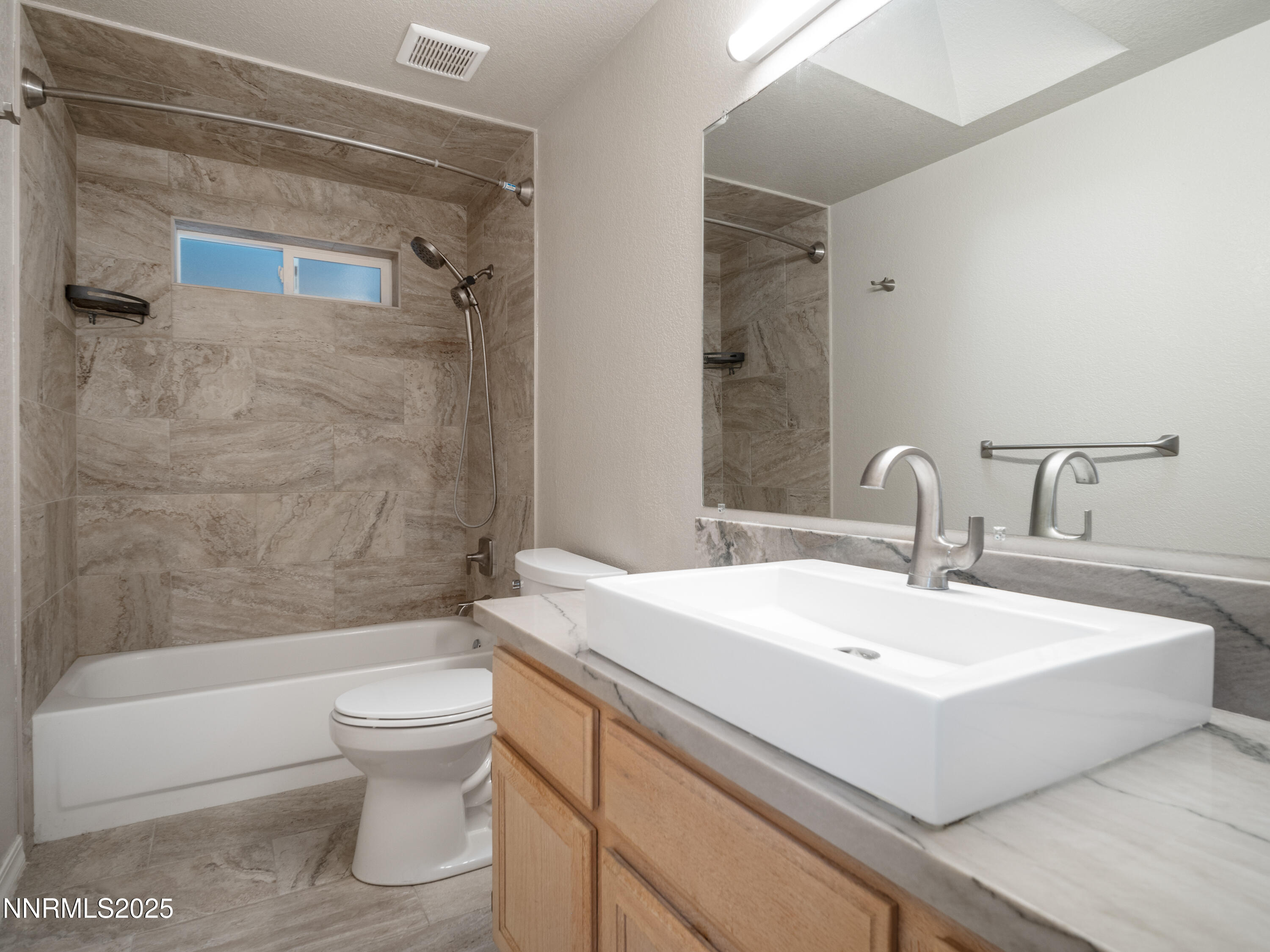 2843 Wade Street Minden, NV 89423 - Photo 43 of 74 a bathroom with a sink toilet and shower