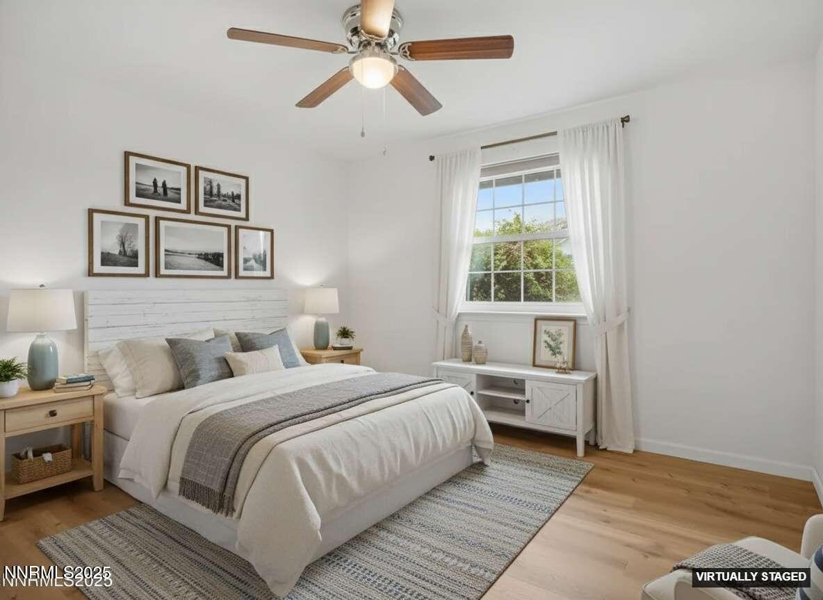 2843 Wade Street Minden, NV 89423 - Photo 8 of 74 a bedroom with a bed and a window