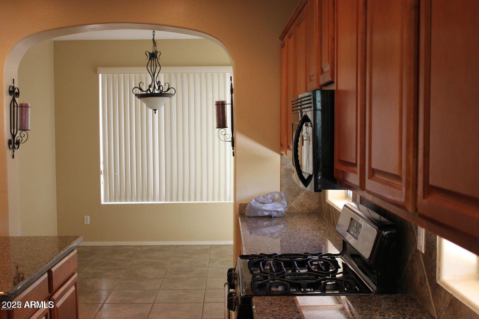 3897 East Powell Way Gilbert, AZ 85298 - Photo 5 of 9 a view of water heater room