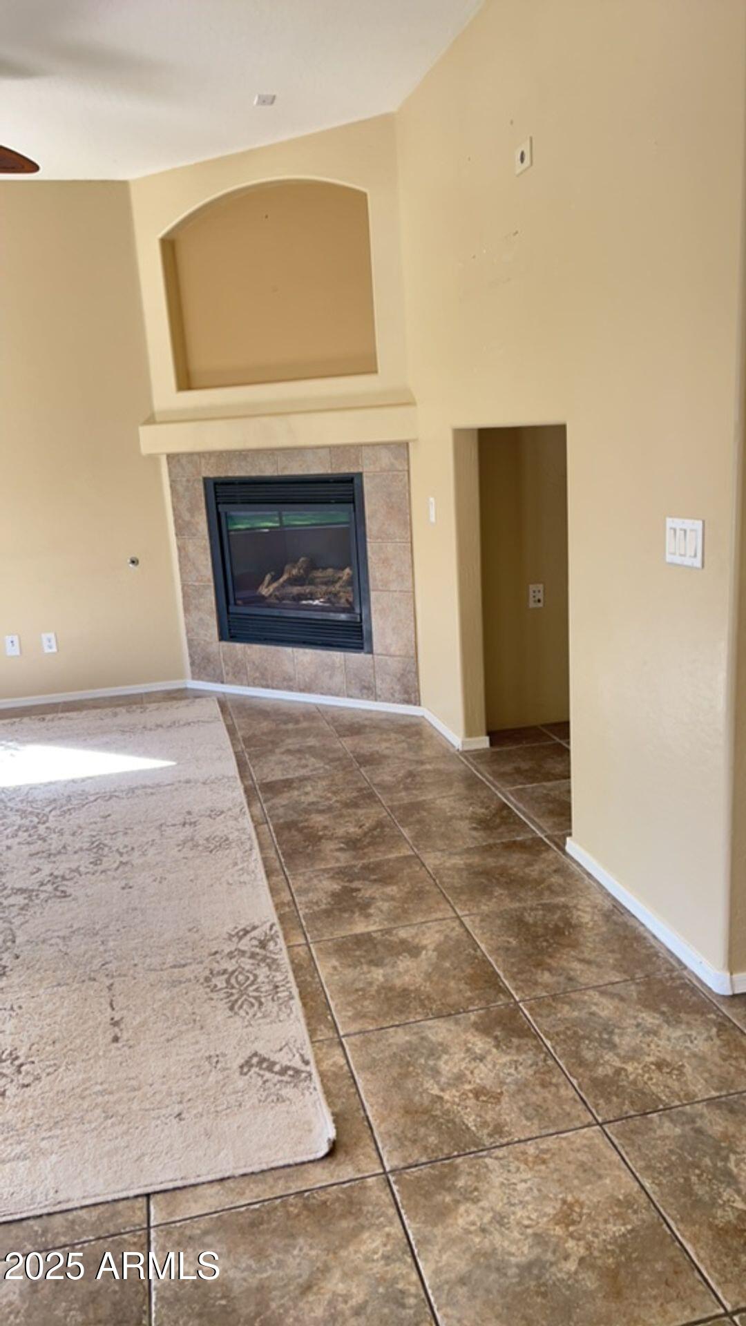 3897 East Powell Way Gilbert, AZ 85298 - Photo 7 of 9 a view of empty room with a fireplace