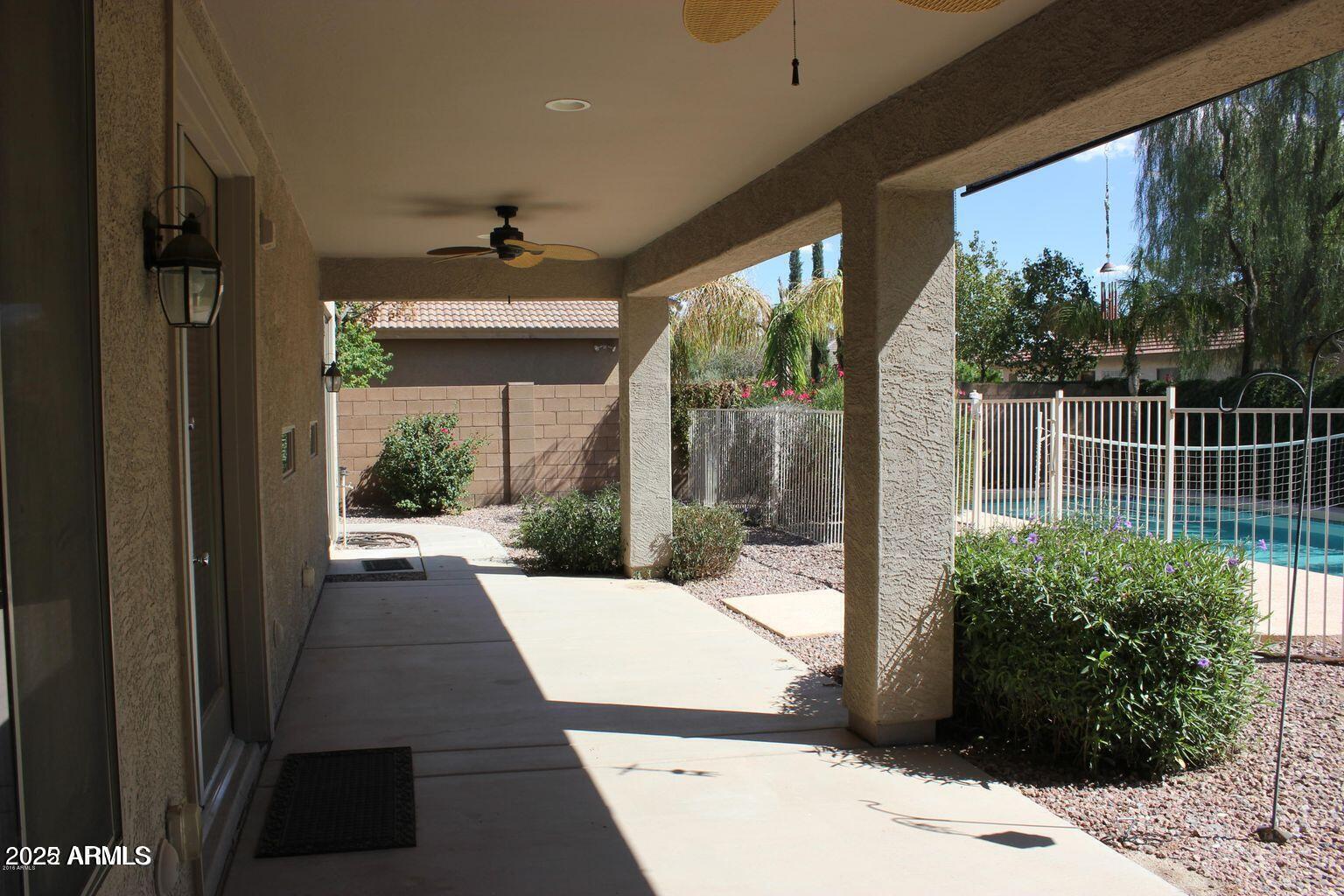 3897 East Powell Way Gilbert, AZ 85298 - Photo 9 of 9 a view of potted plants in front of a building
