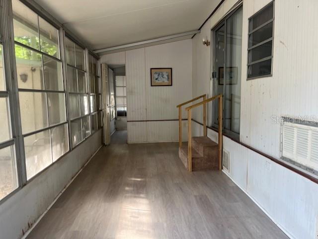 3000 Clarcona Road, Unit 438 Apopka, FL 32703 - Photo 2 of 7 a view of entryway with wooden floor