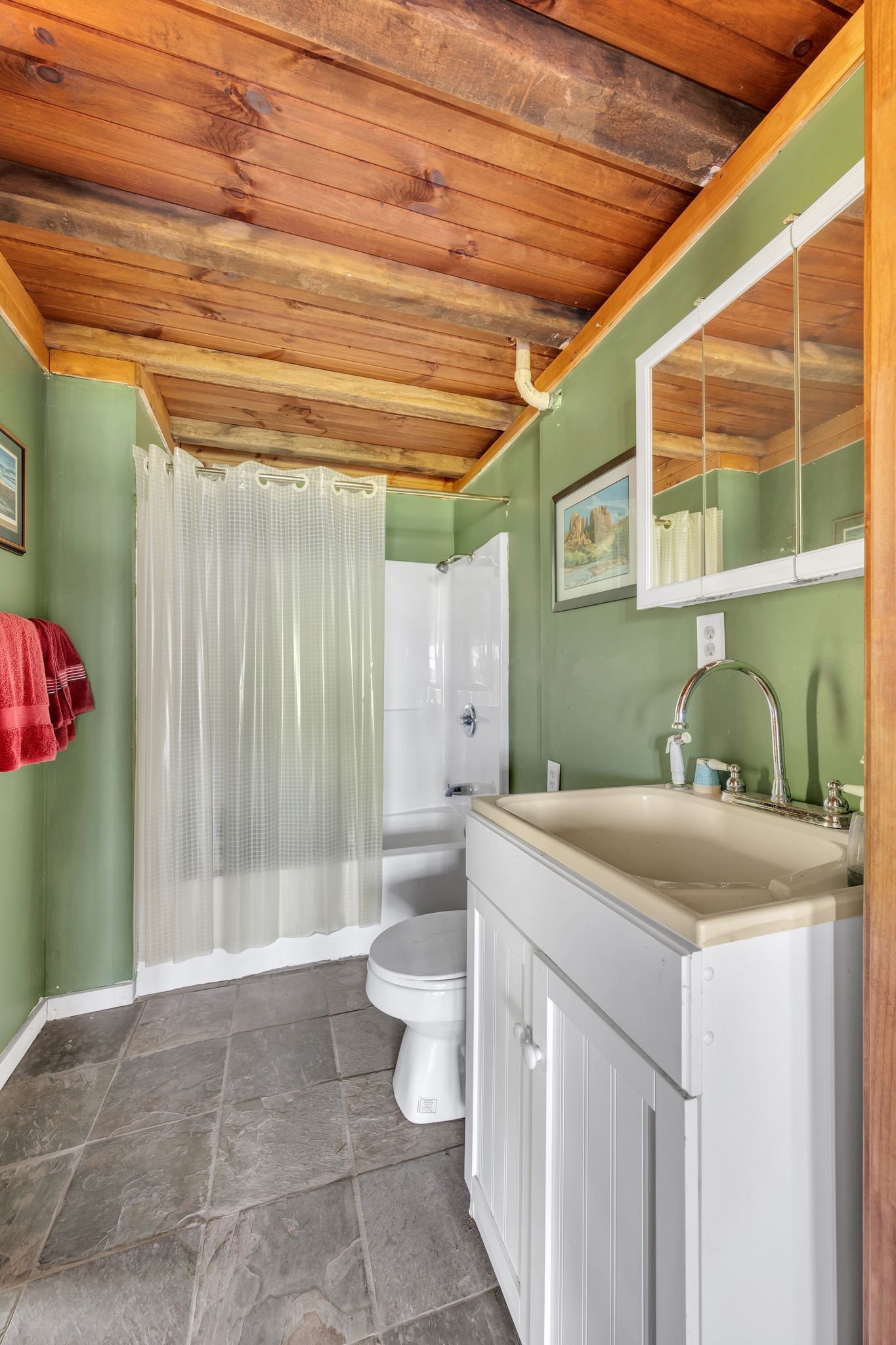 39 Fayetteville Road Kelso, TN 37348 - Photo 57 of 75 a bathroom with a sink a toilet and shower
