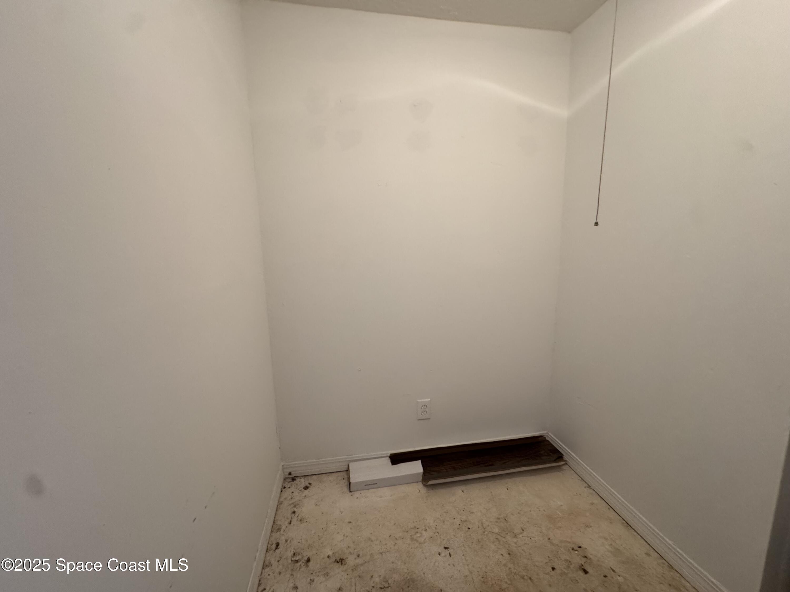 7667 North Wickham Road, Unit 1215 Melbourne, FL 32940 - Photo 19 of 31 a view of small space with racks on wall