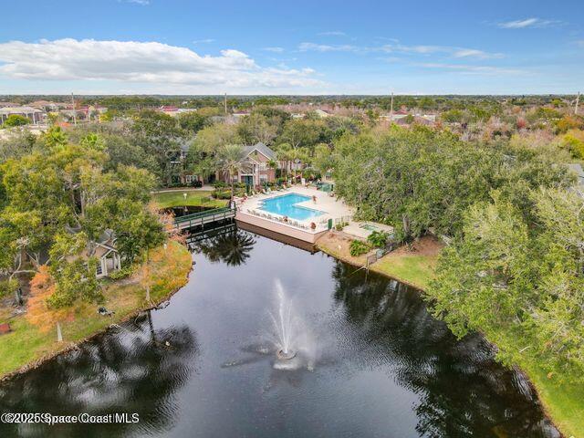 7667 North Wickham Road, Unit 1215 Melbourne, FL 32940 - Photo 24 of 31 a view of a lake with a mountain in the background