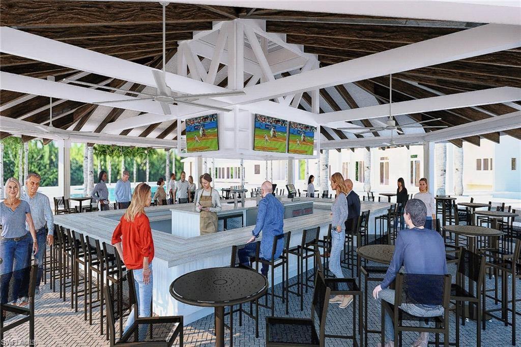 14785 Dockside Lane Naples, FL 34114 - Photo 46 of 50 The NEW TIKI BAR, expected to be completed April 2026, is a popular spot to meet and enjoy time with neighbors, family, and friends. It is located outside the Island Club next to the pool and lake front beach.