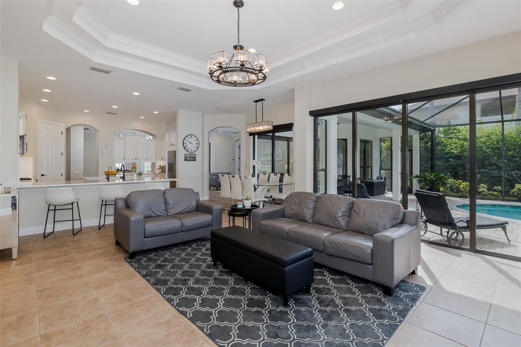1429 El Pardo Drive Trinity, FL 34655 - Photo 15 of 100 a living room with furniture and a large window