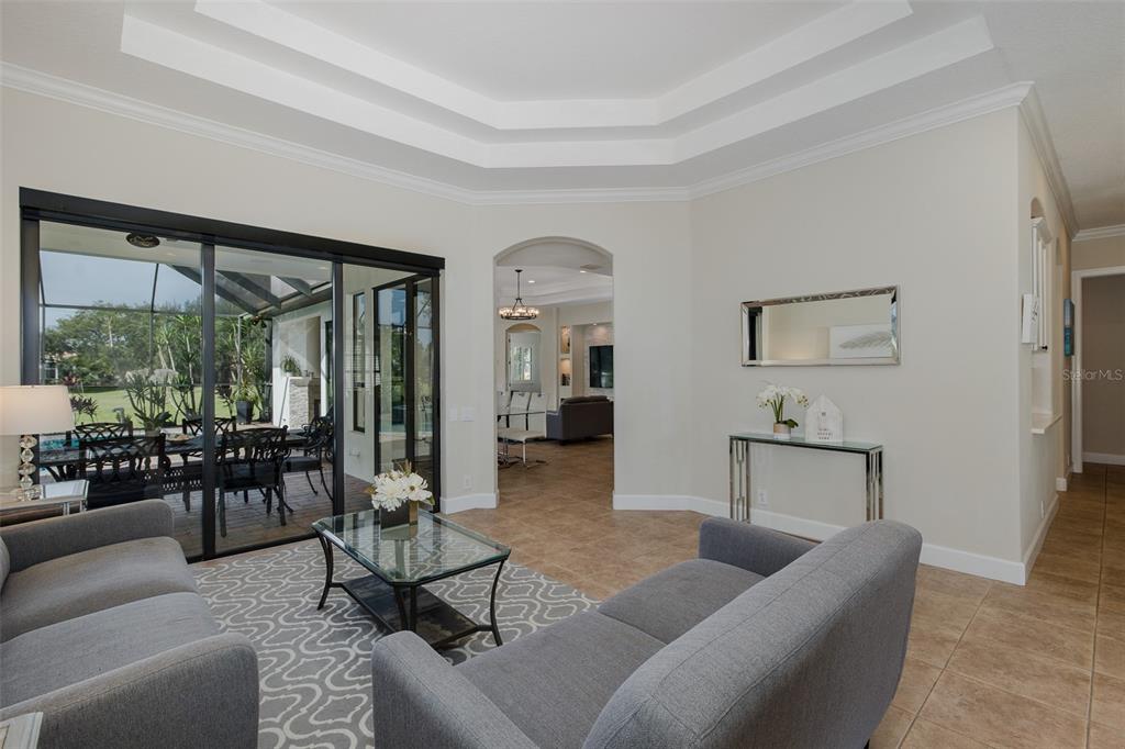 1429 El Pardo Drive Trinity, FL 34655 - Photo 24 of 100 a living room with furniture and a large window