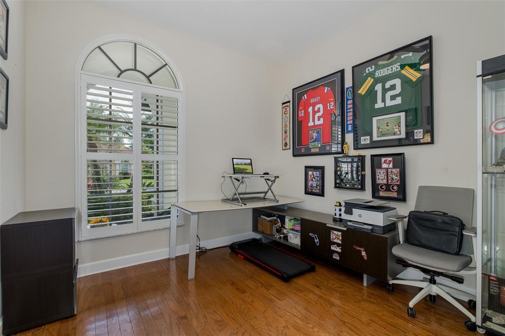 1429 El Pardo Drive Trinity, FL 34655 - Photo 36 of 100 a view of a workspace with furniture and a window