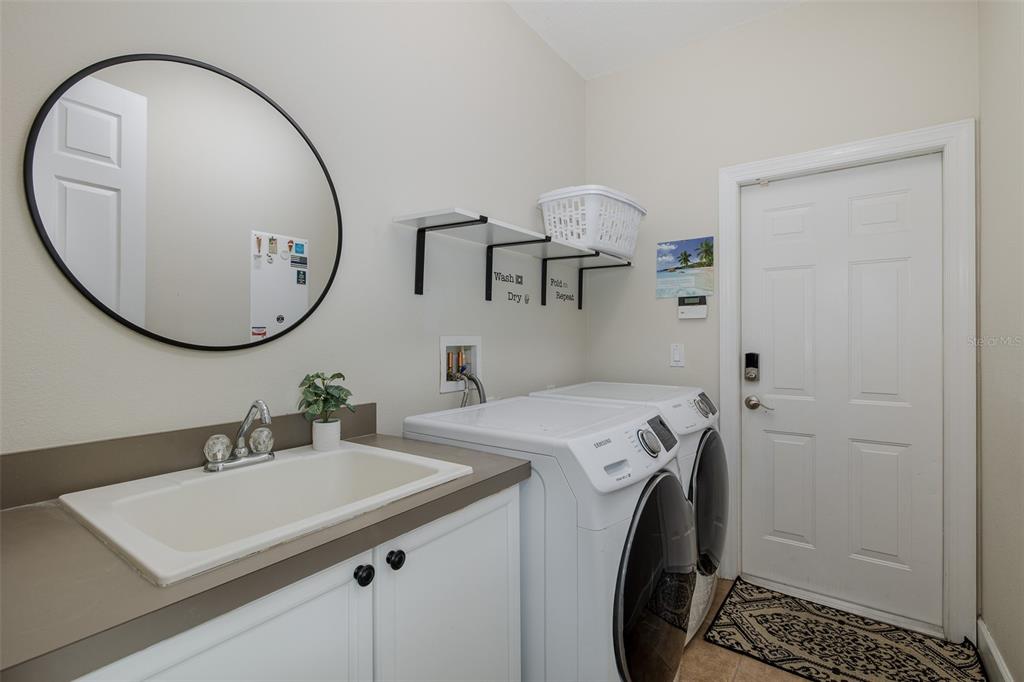 1429 El Pardo Drive Trinity, FL 34655 - Photo 47 of 100 a bathroom with a sink and a mirror
