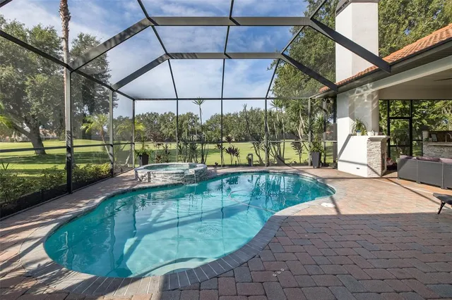 a view of a house with a swimming pool