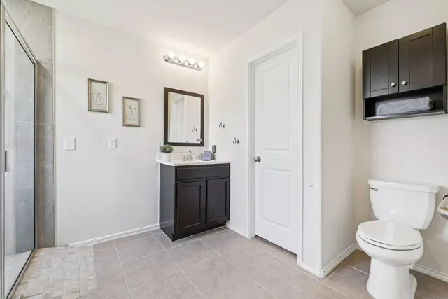a view of balcony with wooden floor and outdoor seating