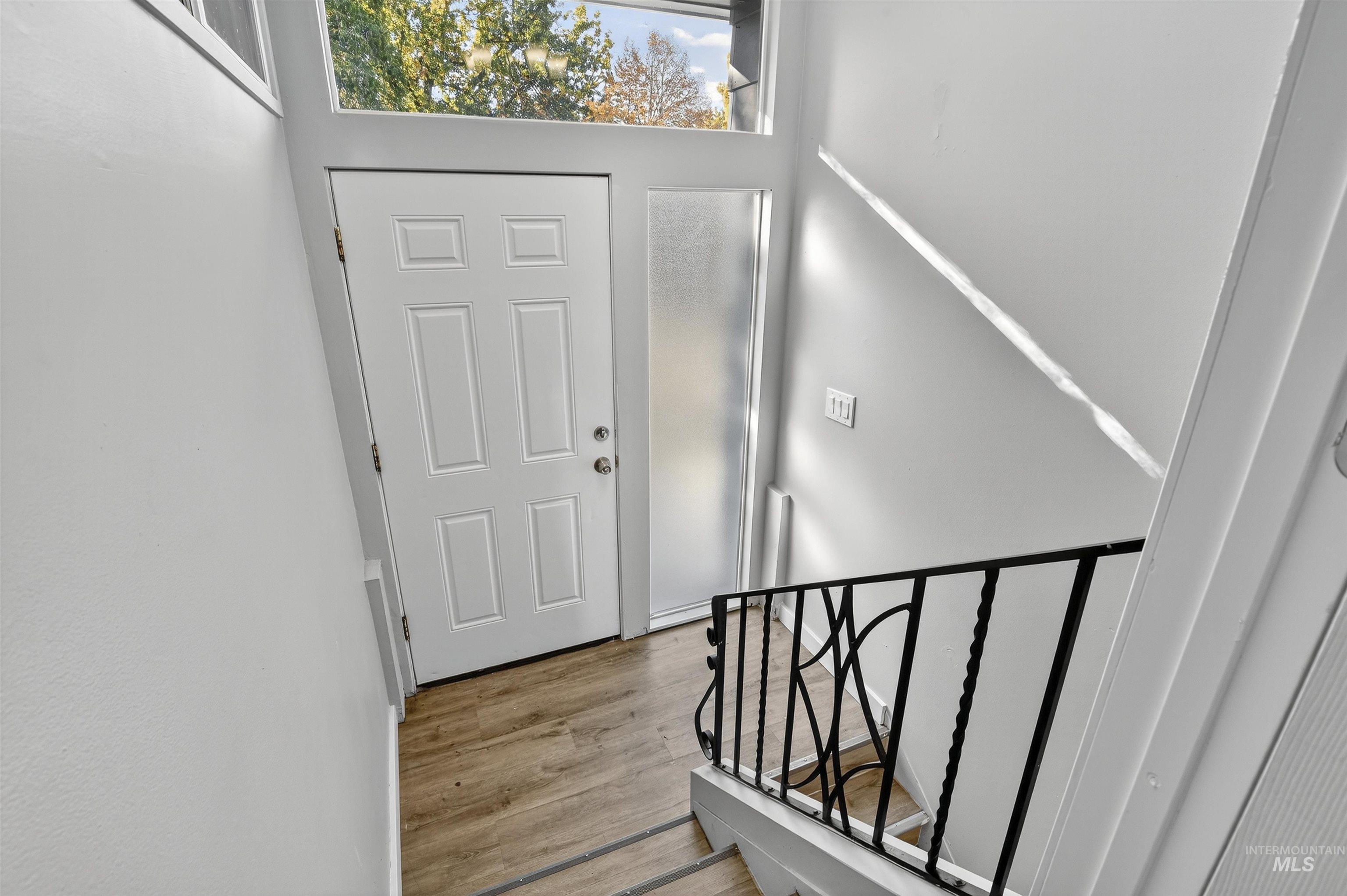 2118 West Targee Street Boise, ID 83705 - Photo 2 of 25 Foyer entrance featuring light wood-type flooring