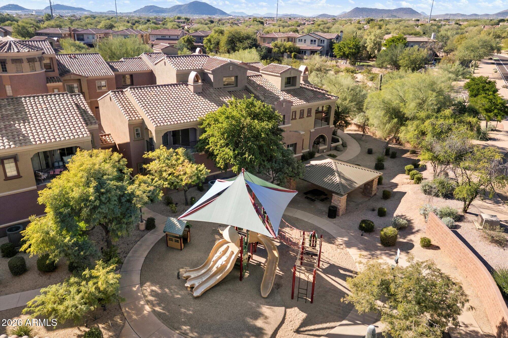 3935 East Rough Rider Road, Unit 1034 Phoenix, AZ 85050 - Photo 21 of 25 Community playground