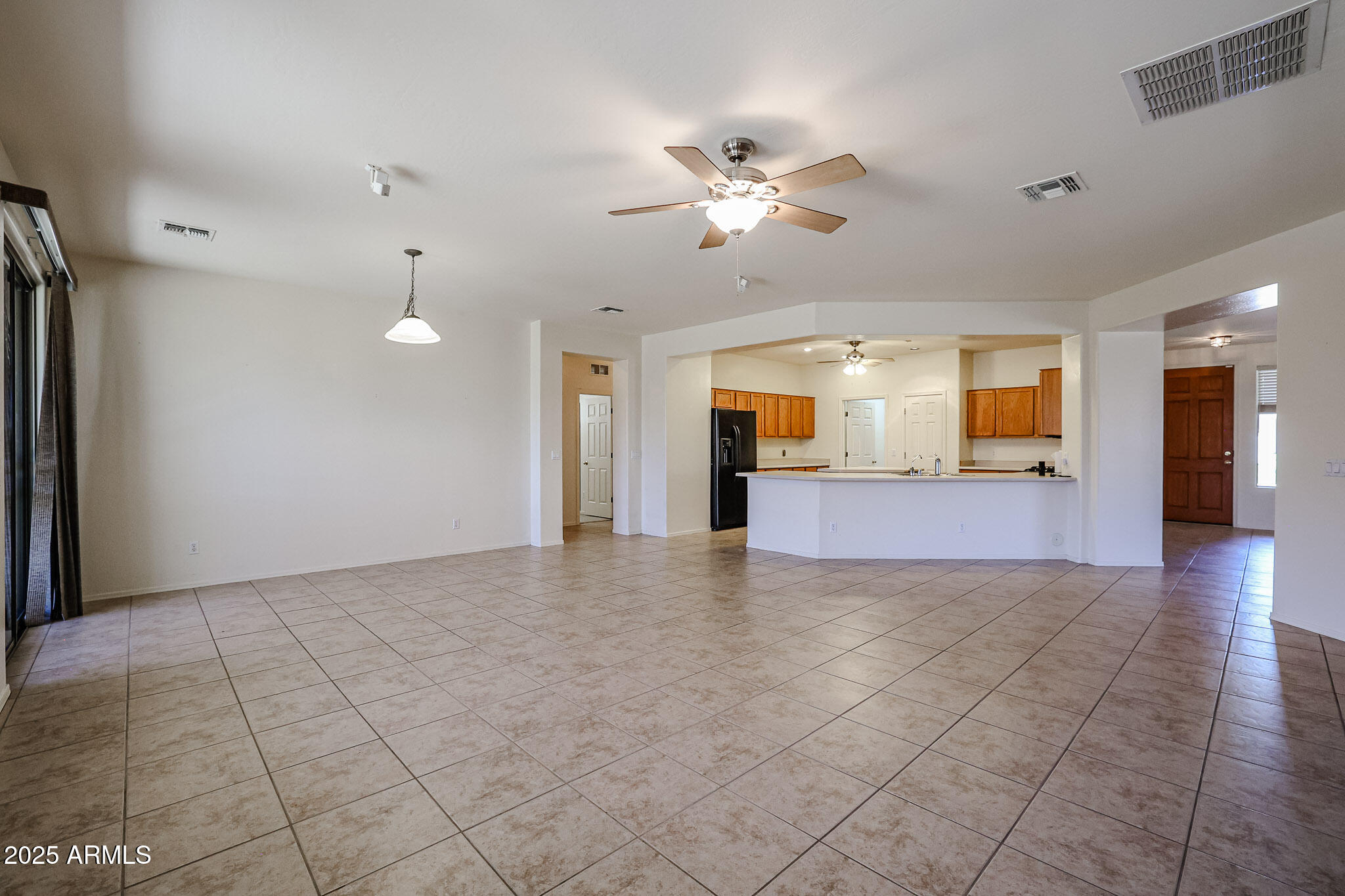 16617 North 40th Drive Phoenix, AZ 85053 - Photo 11 of 15 a view of an empty room and window