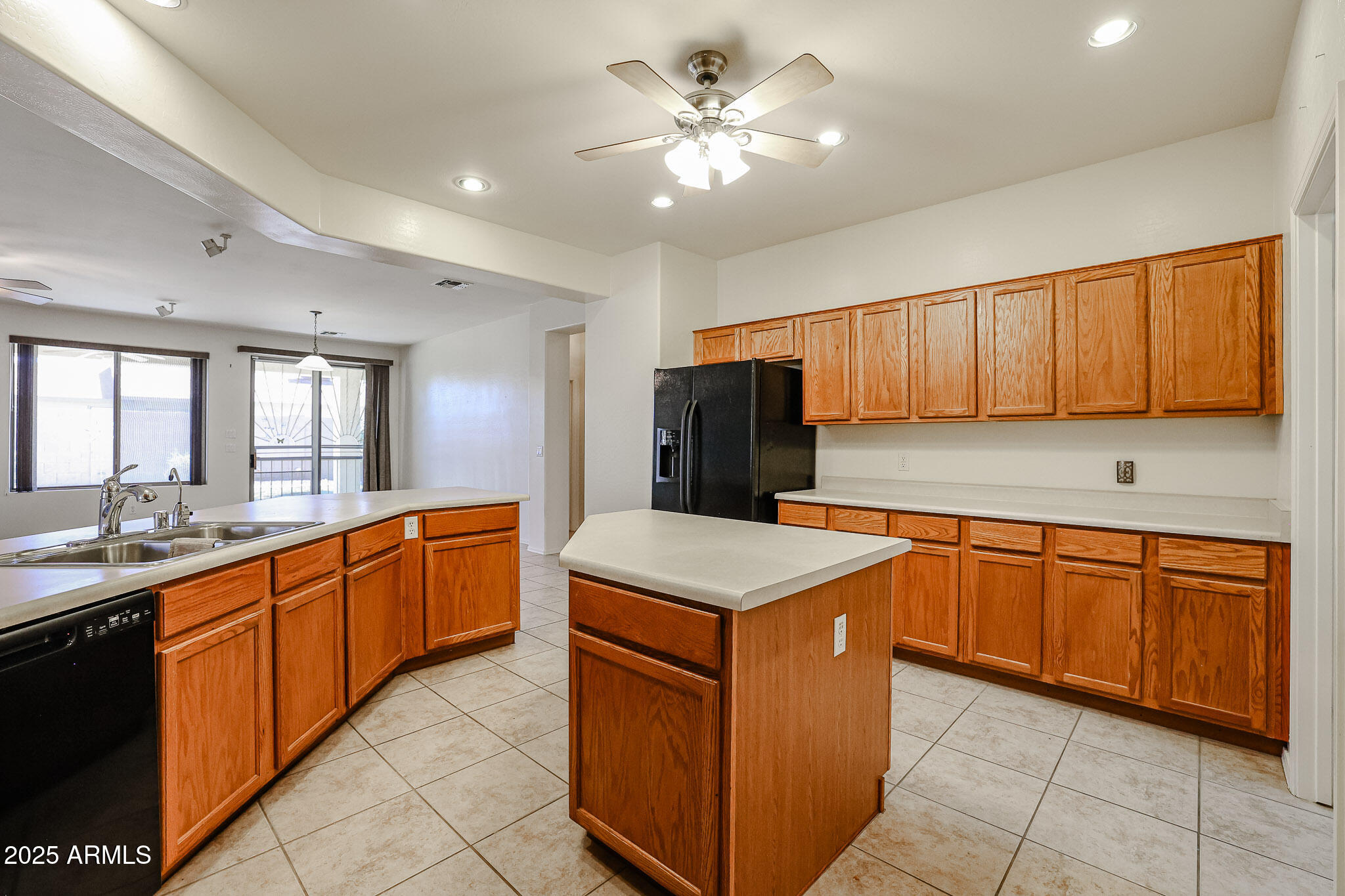 16617 North 40th Drive Phoenix, AZ 85053 - Photo 2 of 15 a kitchen with stainless steel appliances granite countertop a sink stove and refrigerator