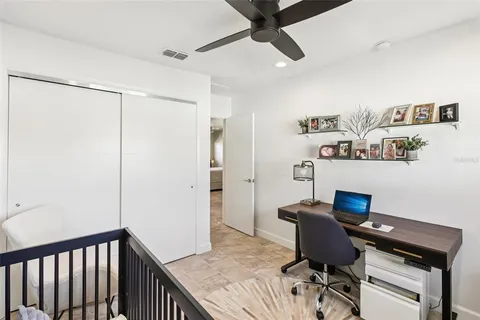 a kitchen with a stove a sink and a refrigerator