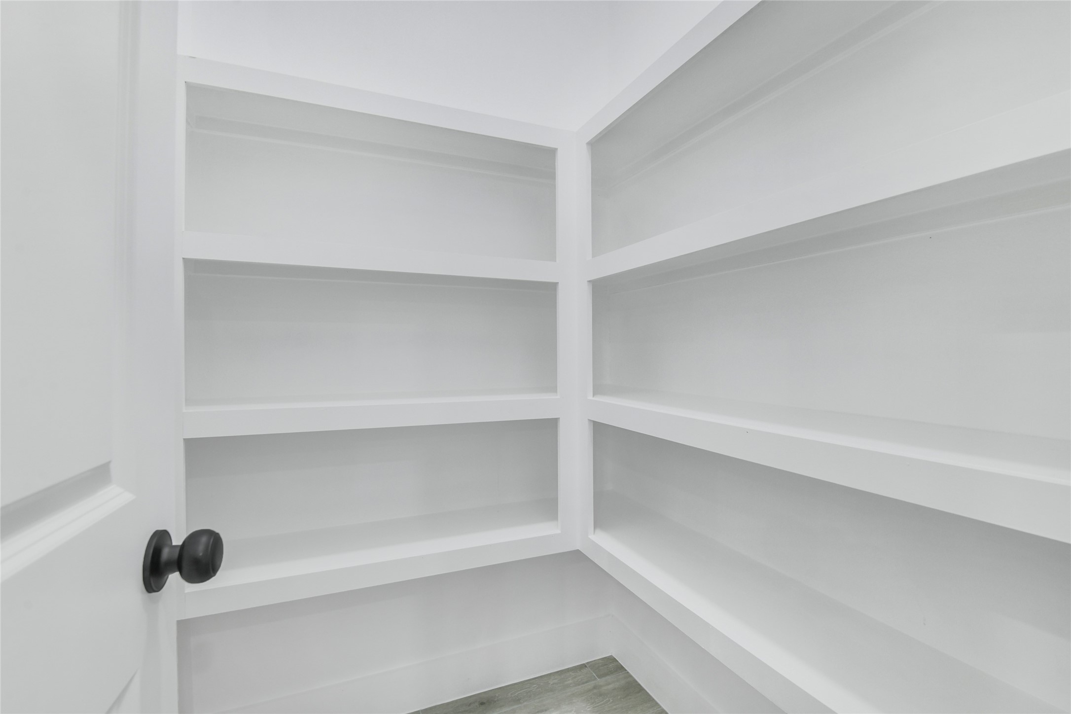 15117 Austin Road Willis, TX 77378 - Photo 16 of 35 a view of an empty walk in closet