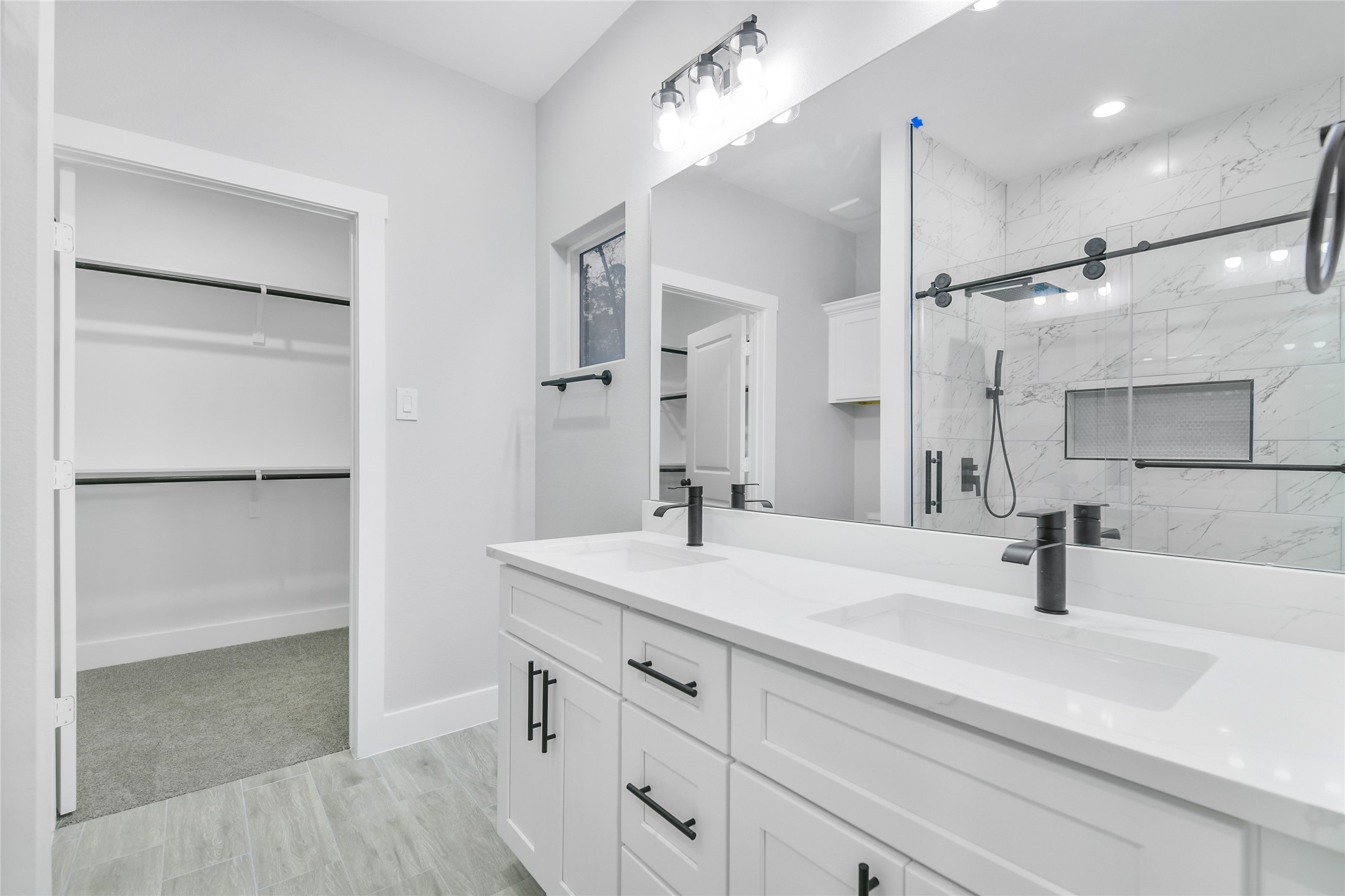 15117 Austin Road Willis, TX 77378 - Photo 19 of 35 a bathroom with a sink and a mirror