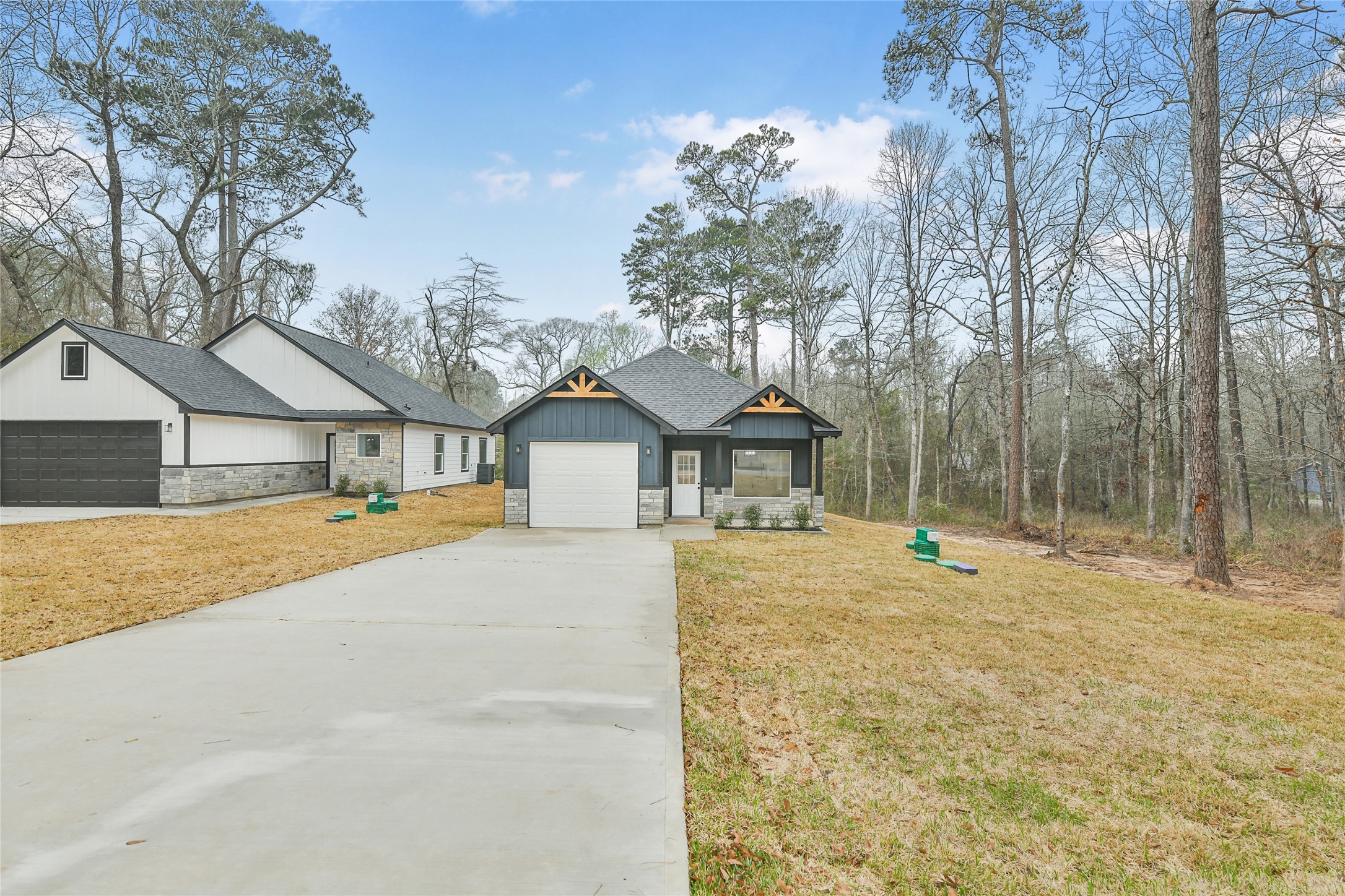15117 Austin Road Willis, TX 77378 - Photo 31 of 35 a house with trees in front of it