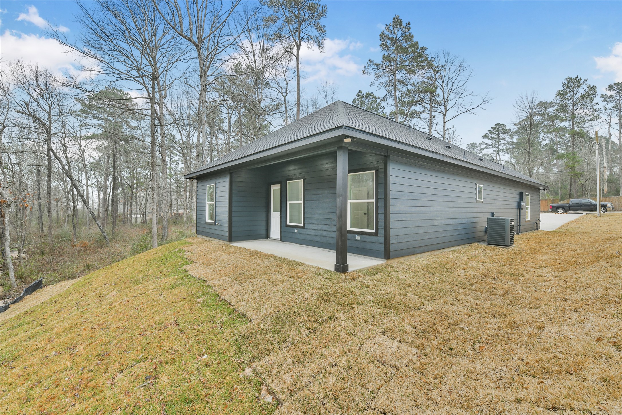 15117 Austin Road Willis, TX 77378 - Photo 34 of 35 a house with a outdoor space
