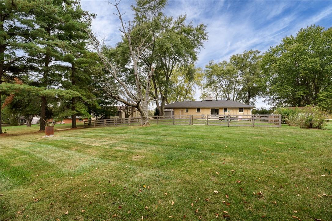 6950 Red Lion 5 Points Road Springboro, OH 45066 - Photo 63 of 78 Expansive green grounds and mature trees create a peaceful backyard setting.