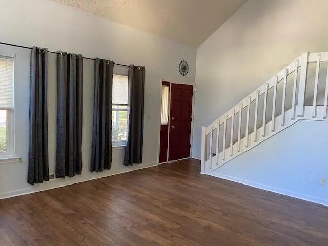 a view of a front door with wooden floor