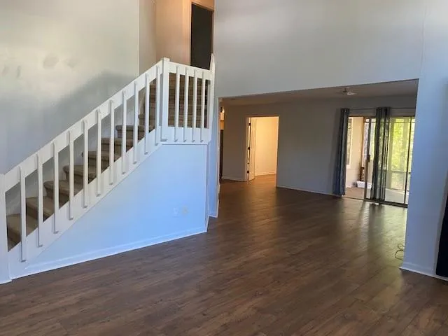 a view of an entryway with wooden floor