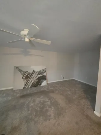 a view of a room with an empty space