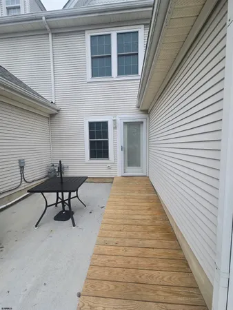 a swimming pool with lounge chair