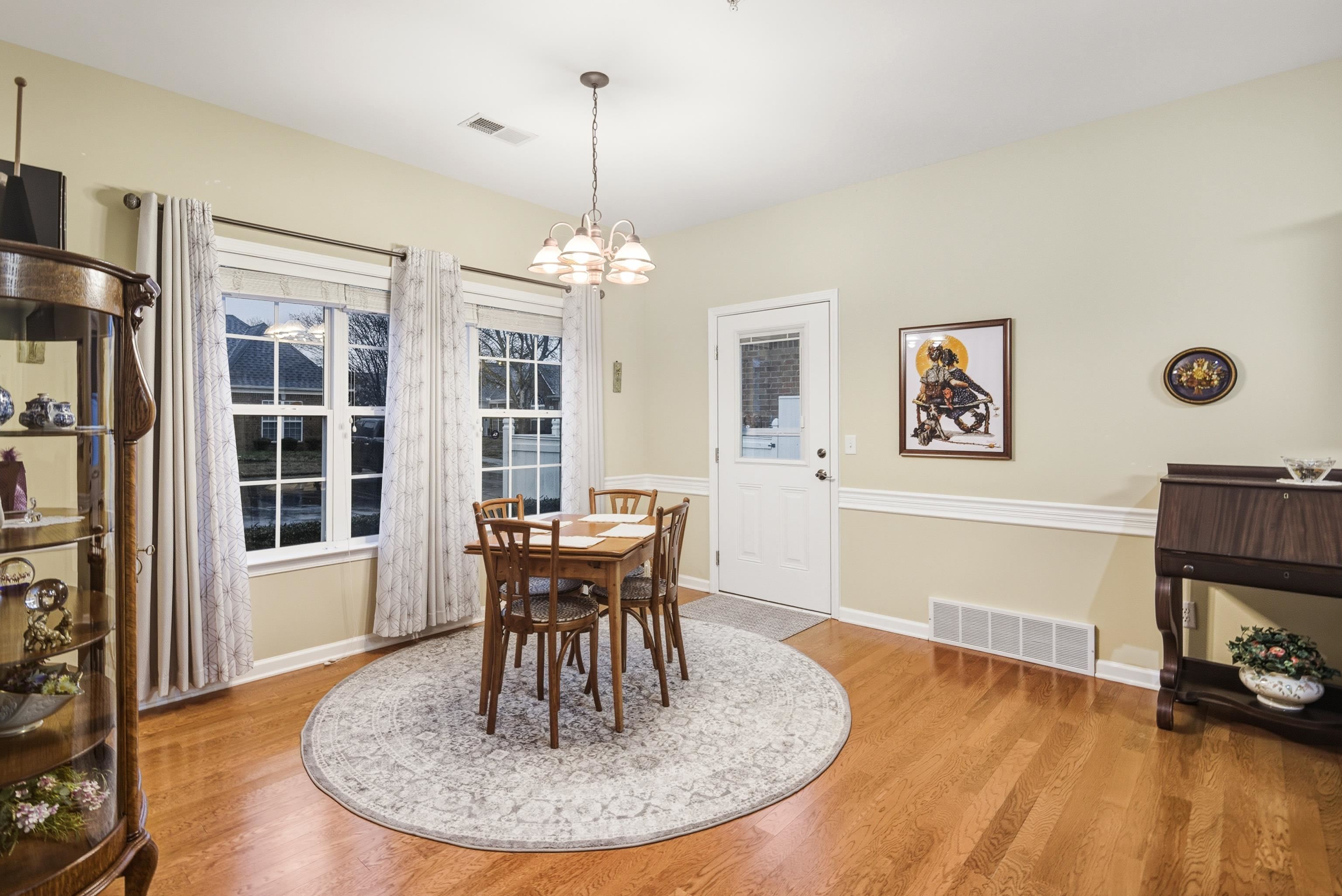 43 Peyton Ridge Drive, Unit 40 Collierville, TN 38017 - Photo 13 of 31 a view of a livingroom with furniture window and wooden floor