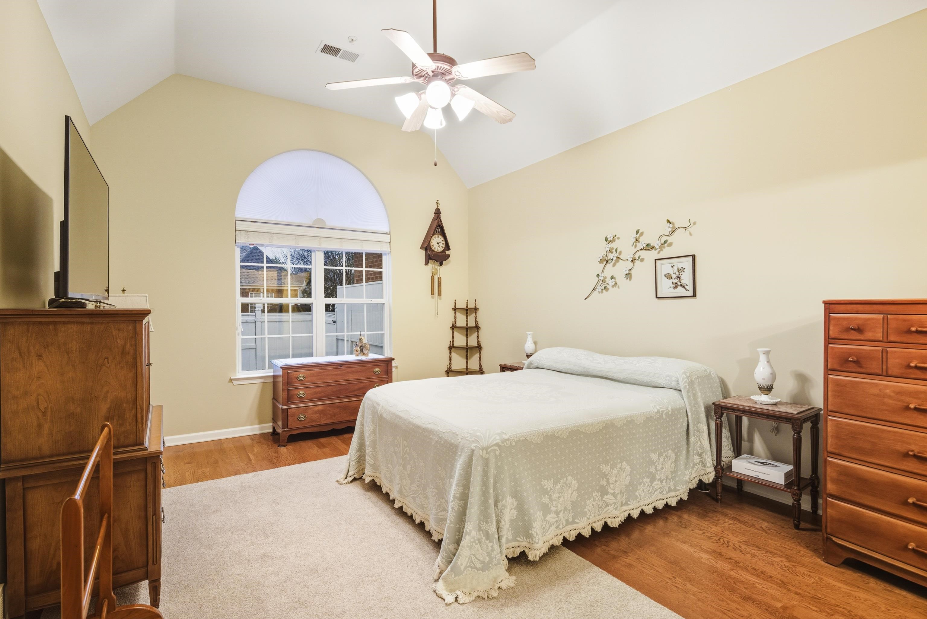 43 Peyton Ridge Drive, Unit 40 Collierville, TN 38017 - Photo 19 of 31 a bedroom with a bed dresser and a window