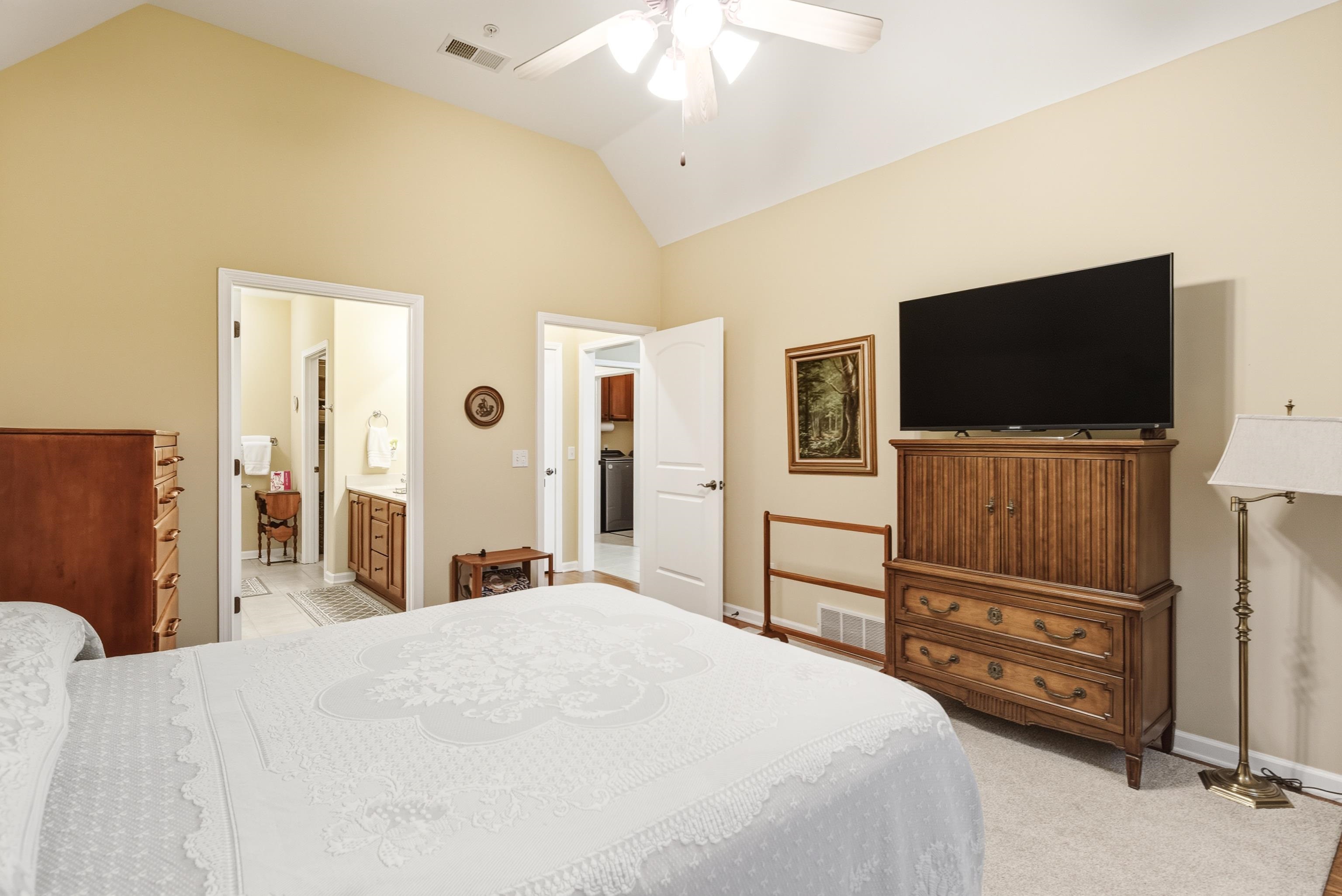43 Peyton Ridge Drive, Unit 40 Collierville, TN 38017 - Photo 20 of 31 a bedroom with a bed and flat screen tv