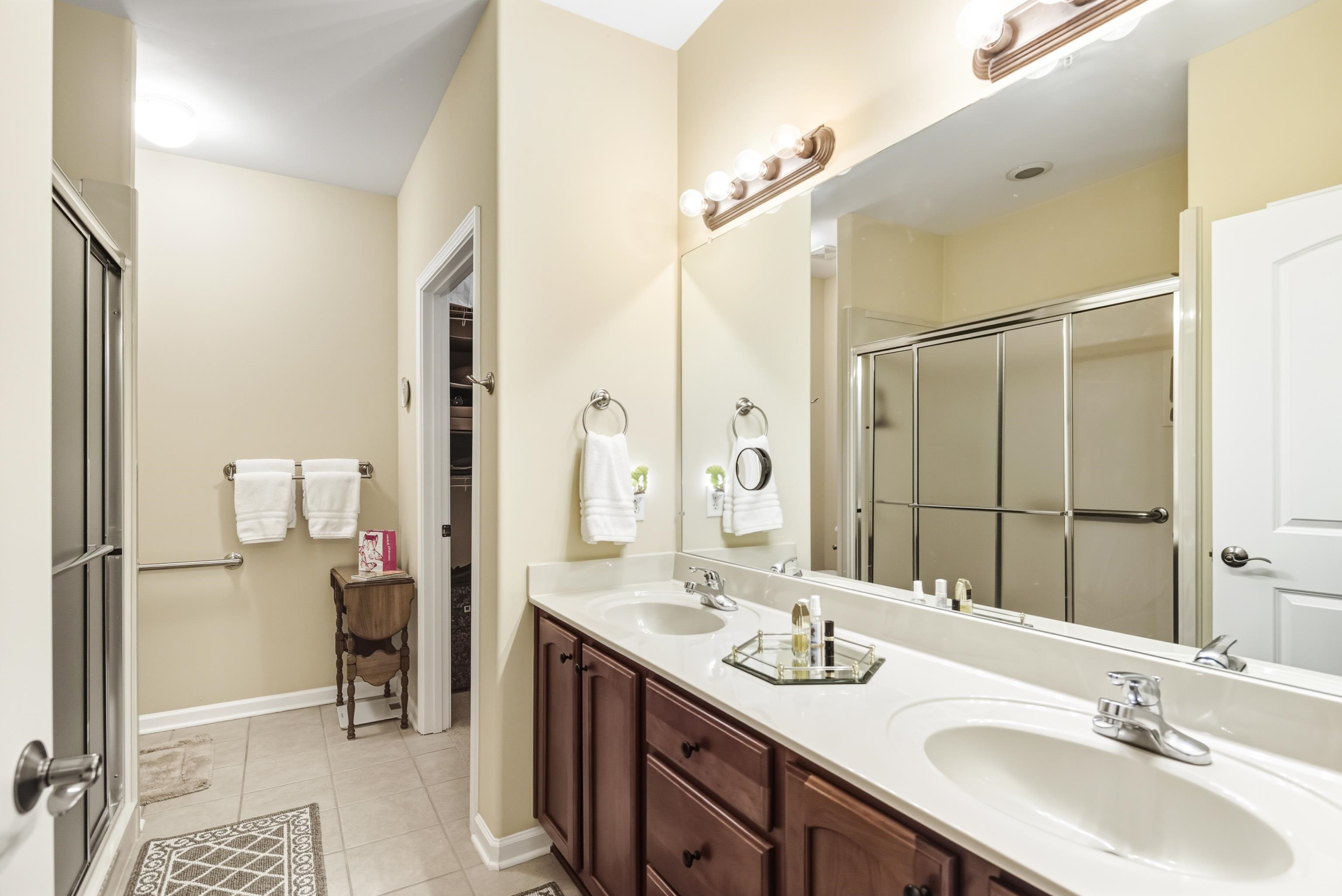 43 Peyton Ridge Drive, Unit 40 Collierville, TN 38017 - Photo 21 of 31 a bathroom with a double vanity sink mirror and double