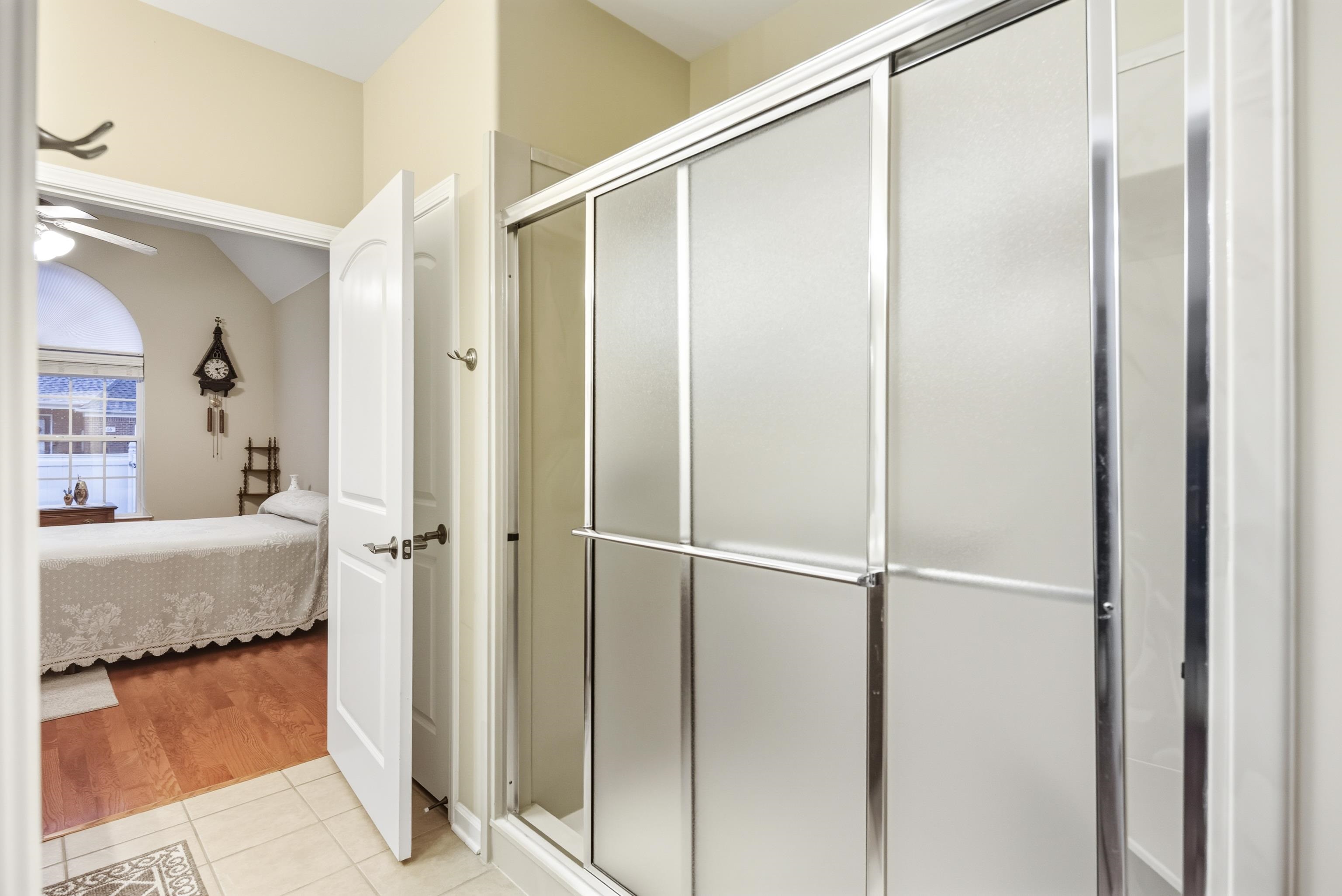 43 Peyton Ridge Drive, Unit 40 Collierville, TN 38017 - Photo 22 of 31 a bathroom with a shower and a sink