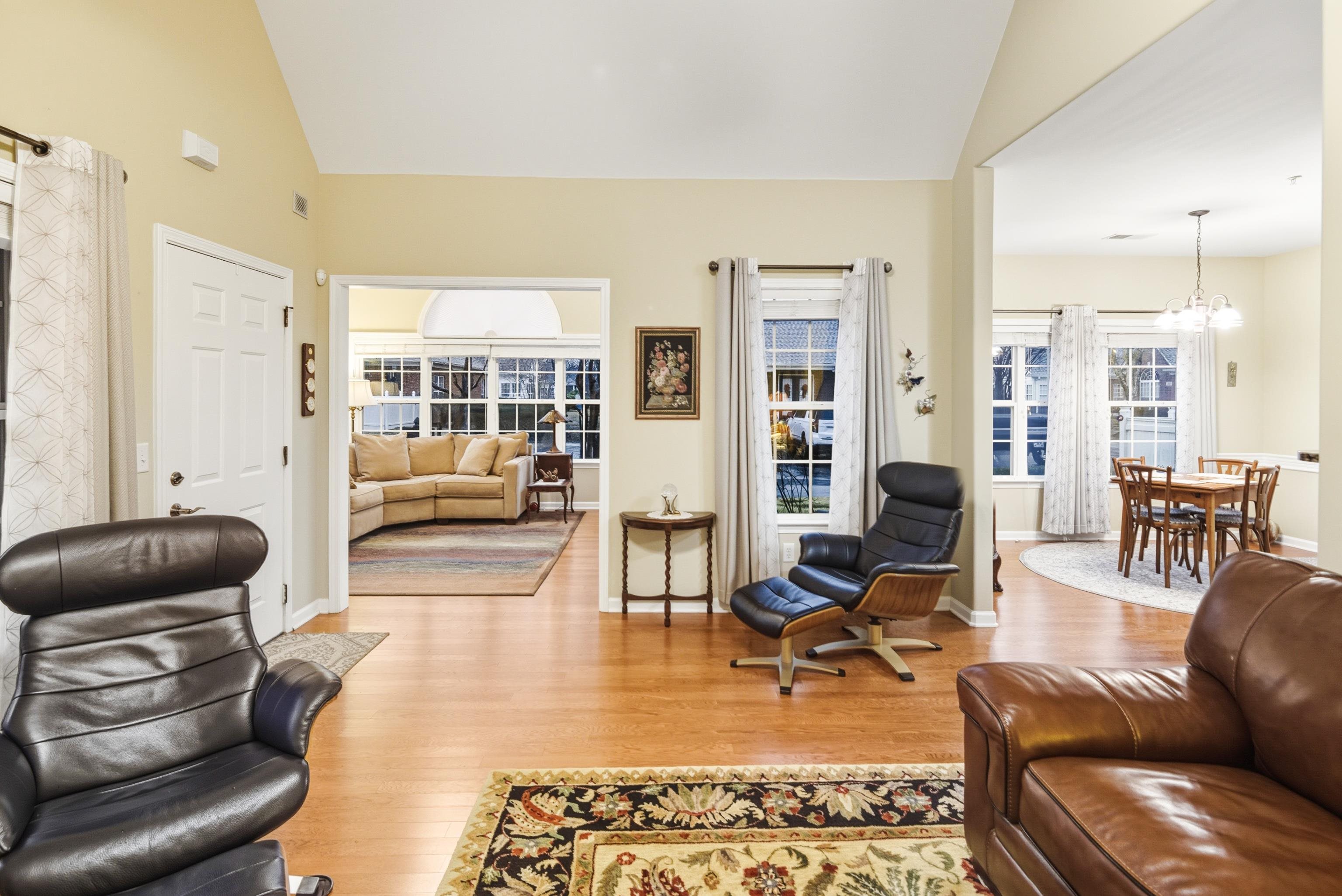 43 Peyton Ridge Drive, Unit 40 Collierville, TN 38017 - Photo 5 of 31 a living room with furniture or couch and a dining table