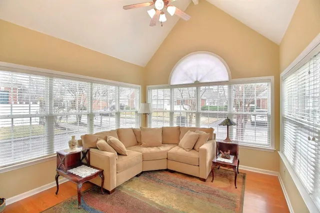 a bedroom with a bed and flat screen tv