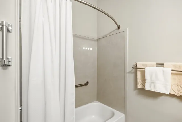 a front view of a house with outdoor seating