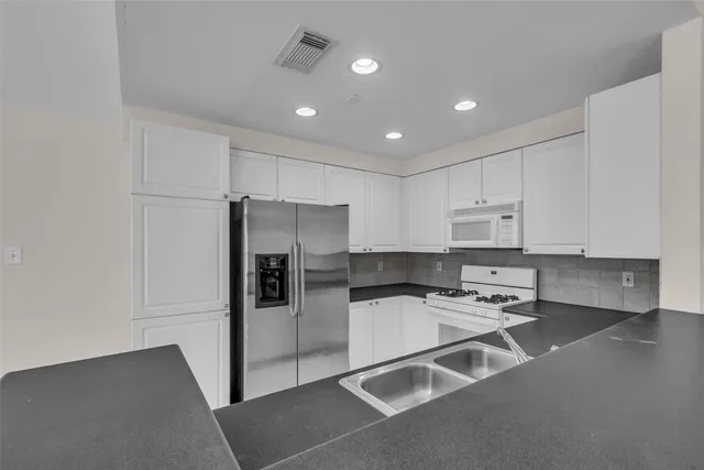 $229,000 | 15 Scarlet Woods Court, The Woodlands, TX 77380