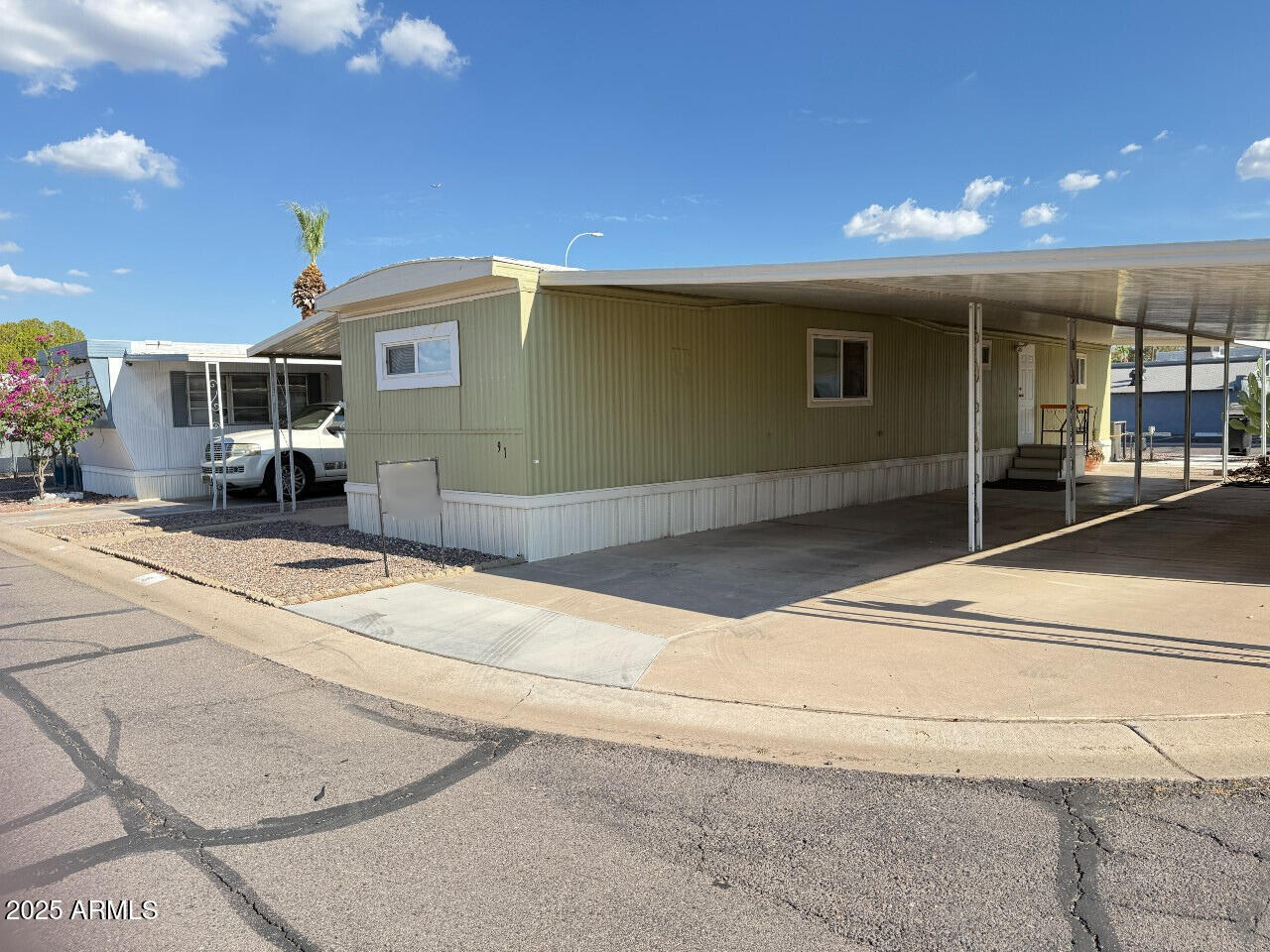 a front view of a house with a garage