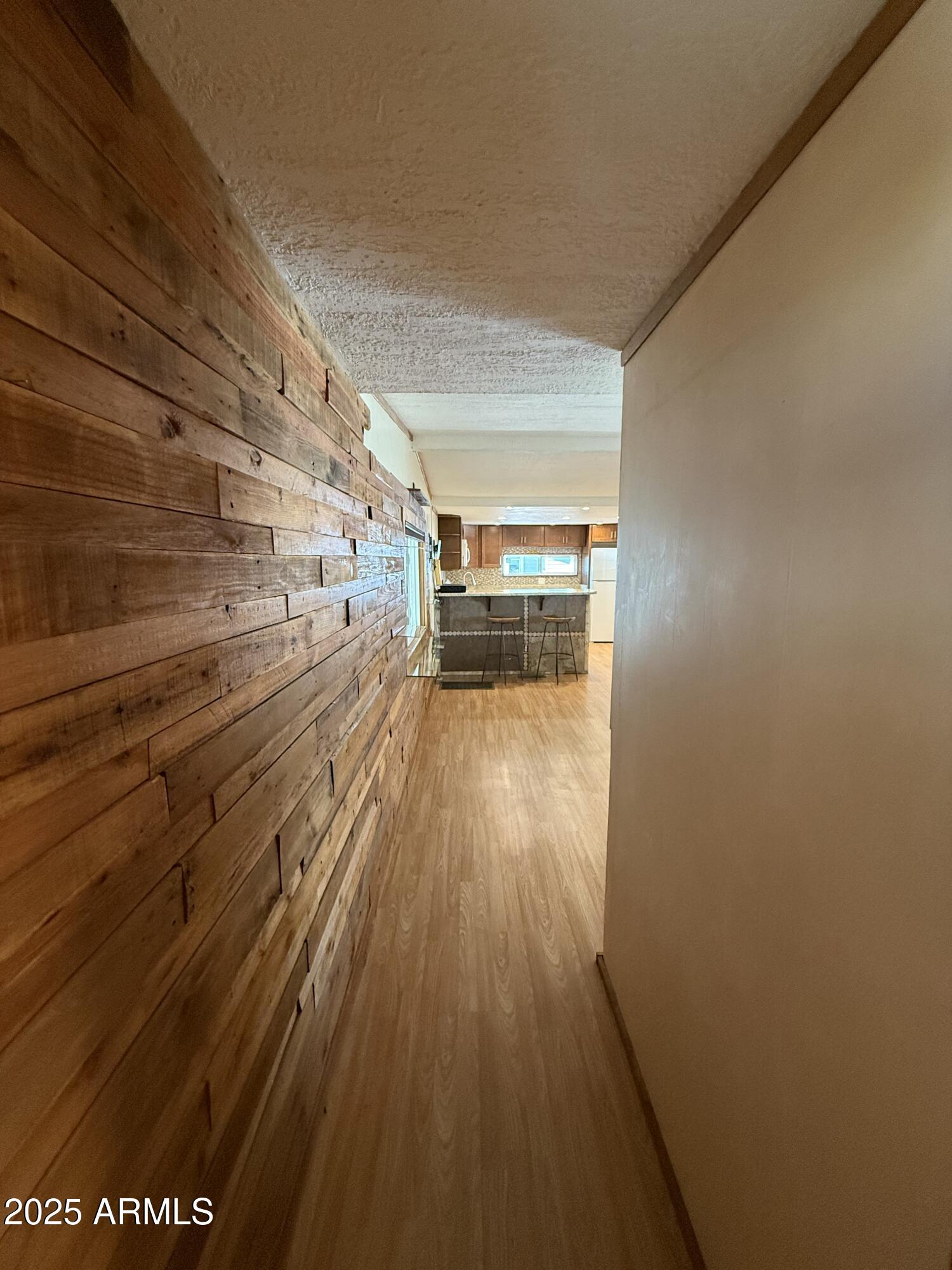 535 South Alma School Road, Unit 91 Mesa, AZ 85210 - Photo 12 of 26 a view of a room with wooden floor