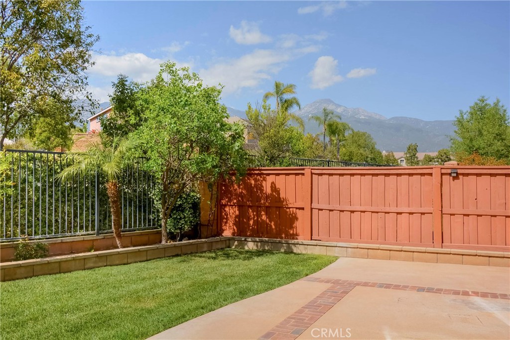 1803 Glen Rosa Street Upland, CA 91784 - Photo 16 of 68 a view of a backyard with a garden and plants