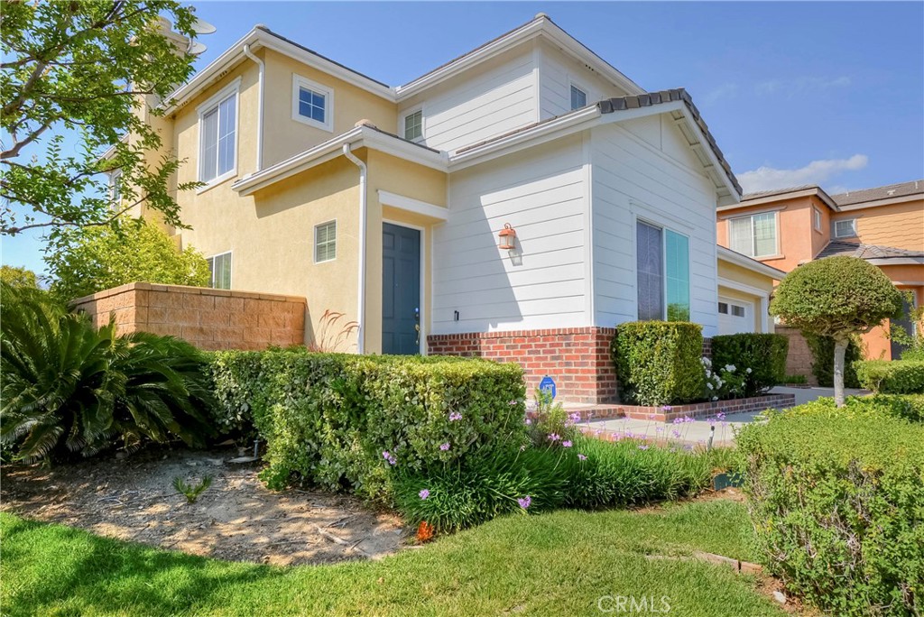 1803 Glen Rosa Street Upland, CA 91784 - Photo 28 of 68 a view of a house with a yard and plants
