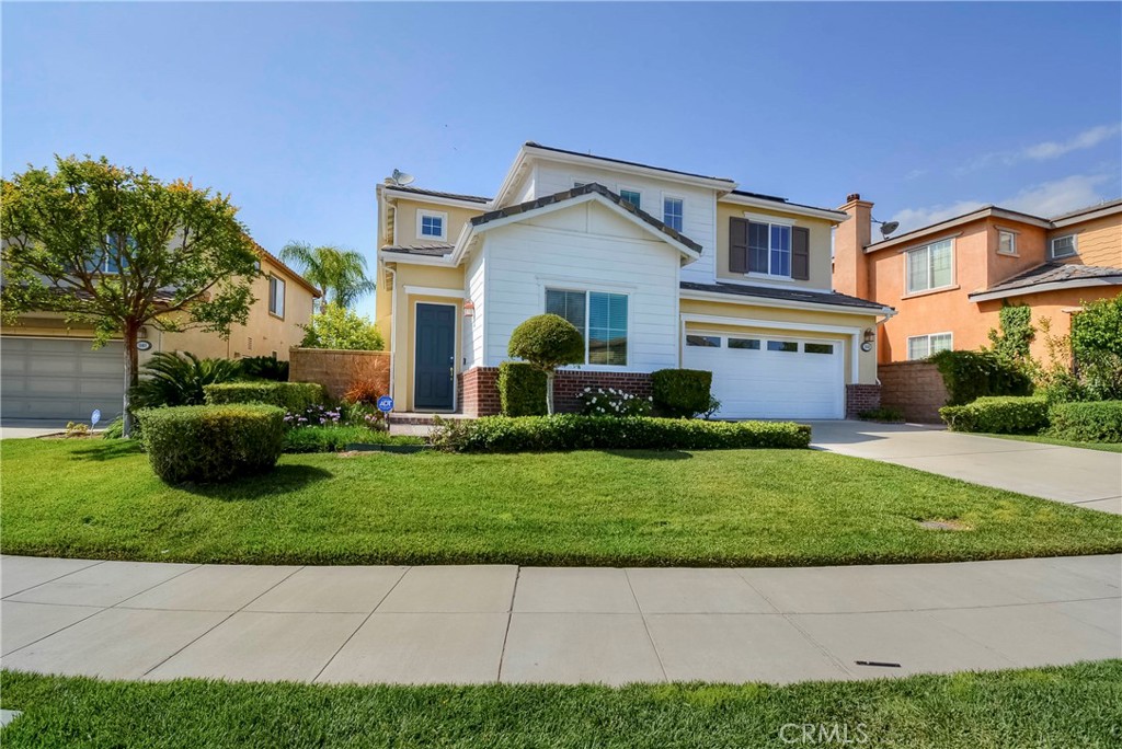 1803 Glen Rosa Street Upland, CA 91784 - Photo 30 of 68 a front view of a house with a garden