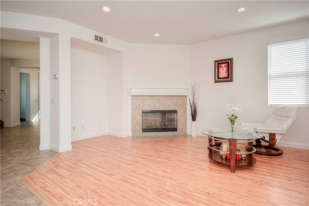 1803 Glen Rosa Street Upland, CA 91784 - Photo 3 of 68 a living room with furniture and a fireplace