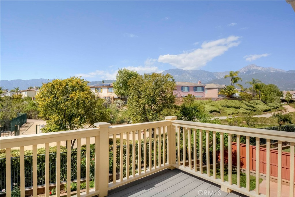 1803 Glen Rosa Street Upland, CA 91784 - Photo 32 of 68 a view of a balcony with wooden fence and floor